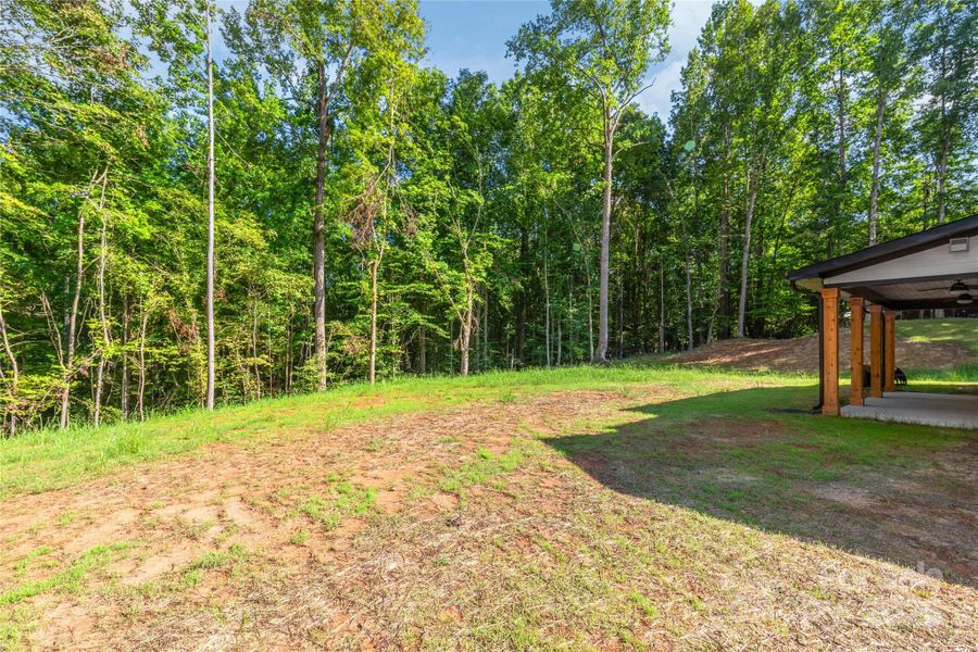 Front exterior of a new home in , Waxhaw, NC, highlighting curb appeal (Image 29). Front exterior of a new home in , Waxhaw, NC, highlighting curb appeal (Image 29).