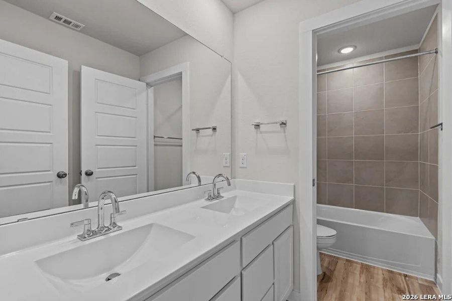 Furnished interior view inside a new home in Spring Creek, San Antonio (Image 11). Furnished interior view inside a new home in Spring Creek, San Antonio (Image 11).