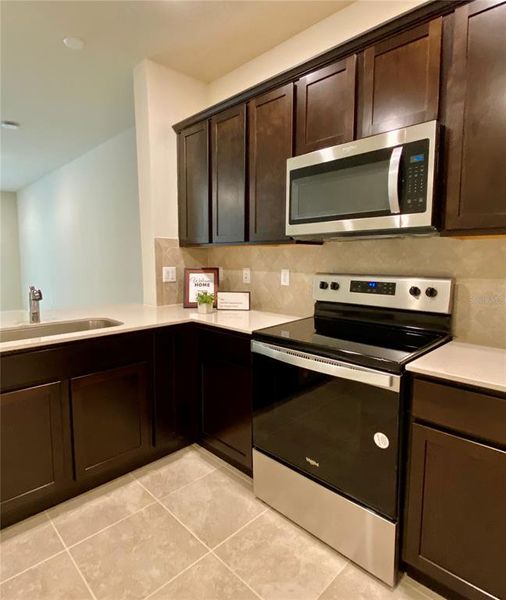 Furnished interior view inside a new home in , Kissimmee (Image 5).