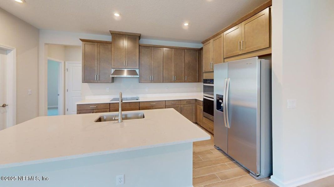 Furnished interior view inside a new home in Lakes at Bella Lago, Green Cove Springs (Image 3).