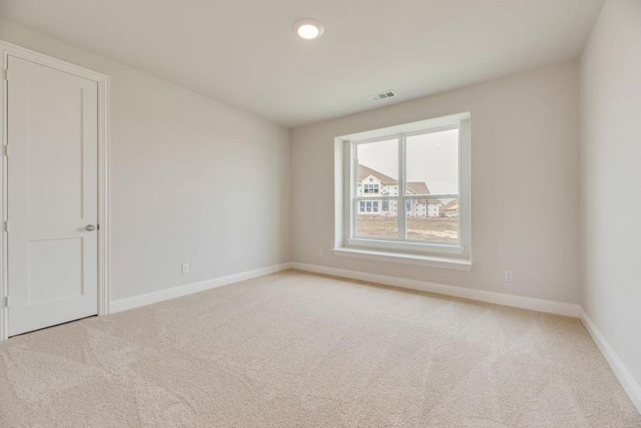 Spacious, unfurnished interior of a new home in Trails at Cottonwood Creek, Rowlett (Image 13).