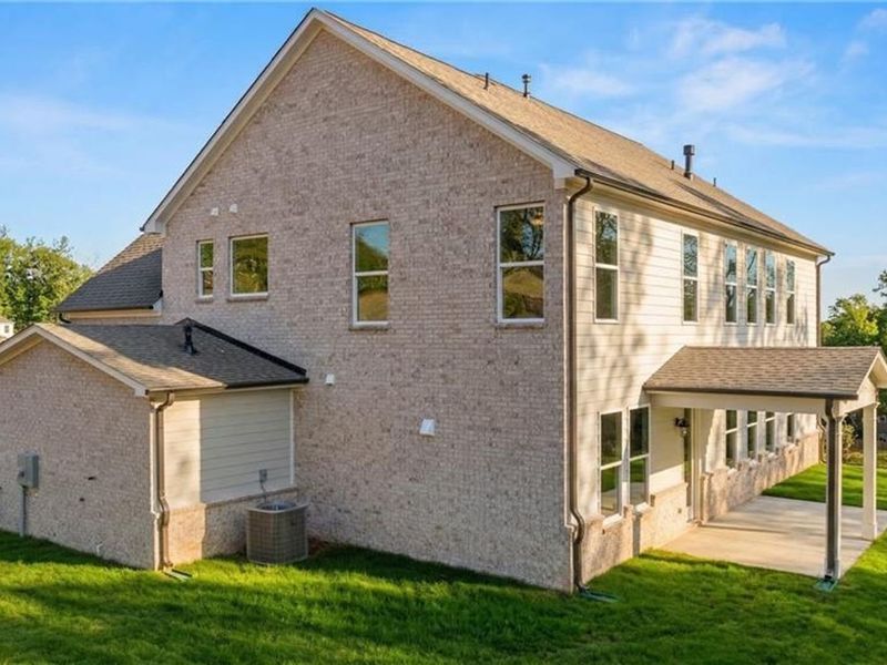Exterior details and patio area of a home in Melody Lakeside Estates, Buford (Image 3).