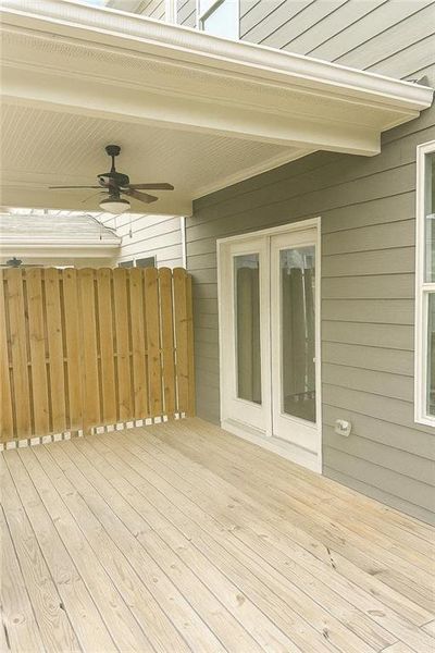 Exterior details and patio area of a home in Towns at Enclave, Lawrenceville (Image 23).