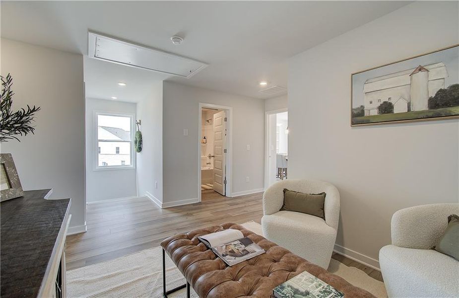 Furnished interior view inside a new home in The Towns at Auburn Station East, Auburn (Image 12).