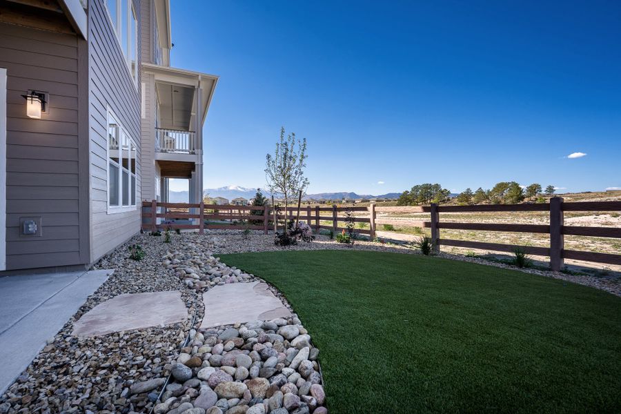 Exterior details and patio area of a home in Revel Crossing at Wolf Ranch - The Panorama Collection, Colorado Springs (Image 3). Exterior details and patio area of a home in Revel Crossing at Wolf Ranch - The Panorama Collection, Colorado Springs (Image 3).