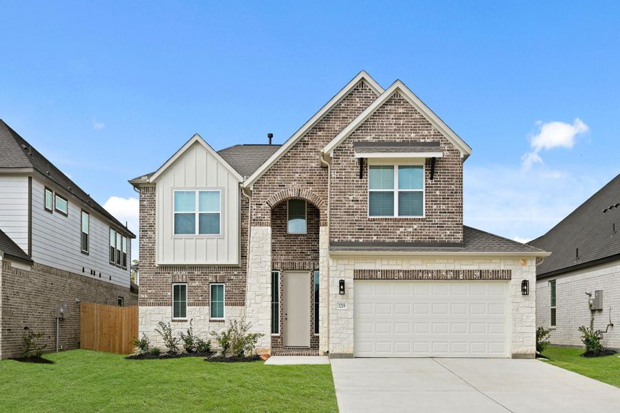Front exterior of a new home in Barton Creek Ranch, Conroe, TX, highlighting curb appeal (Image 19). Front exterior of a new home in Barton Creek Ranch, Conroe, TX, highlighting curb appeal (Image 19).