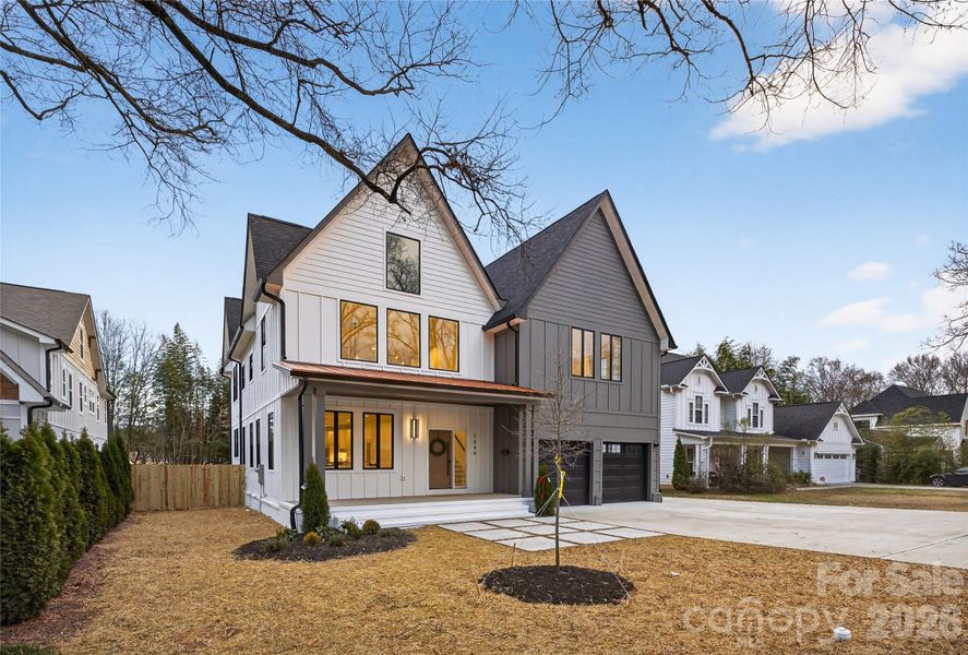 Front exterior of a new home in , Charlotte, NC, highlighting curb appeal (Image 24).