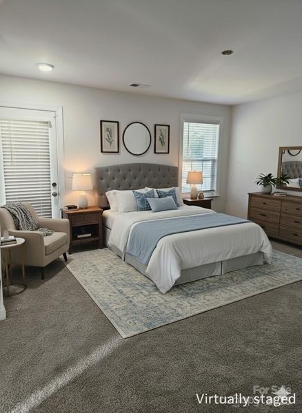 Virtually staged main level guest room w/en suite bath