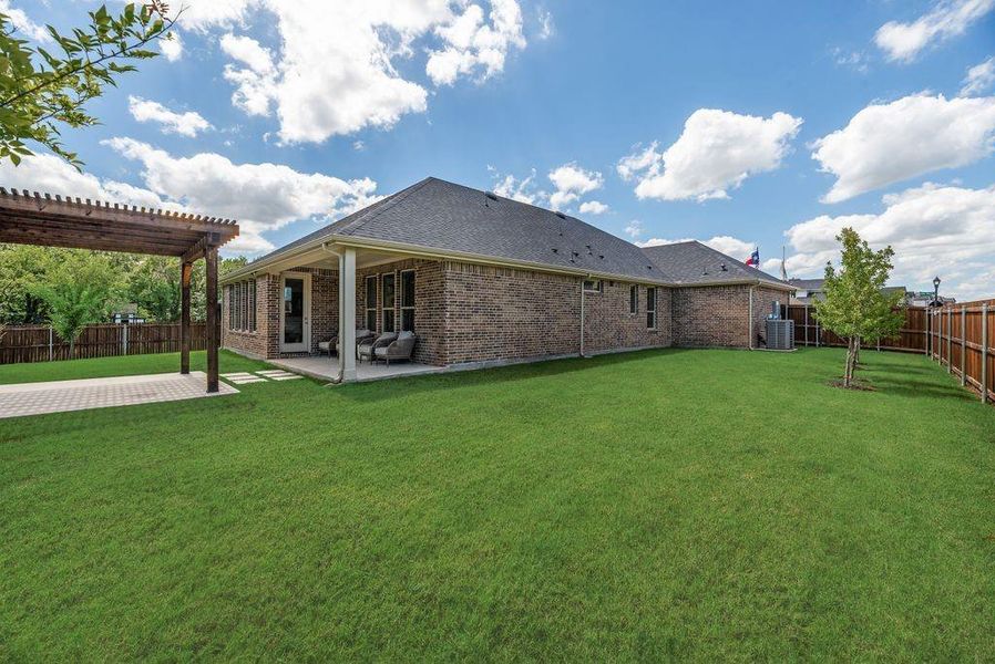 Exterior details and patio area of a home in , Anna (Image 3).