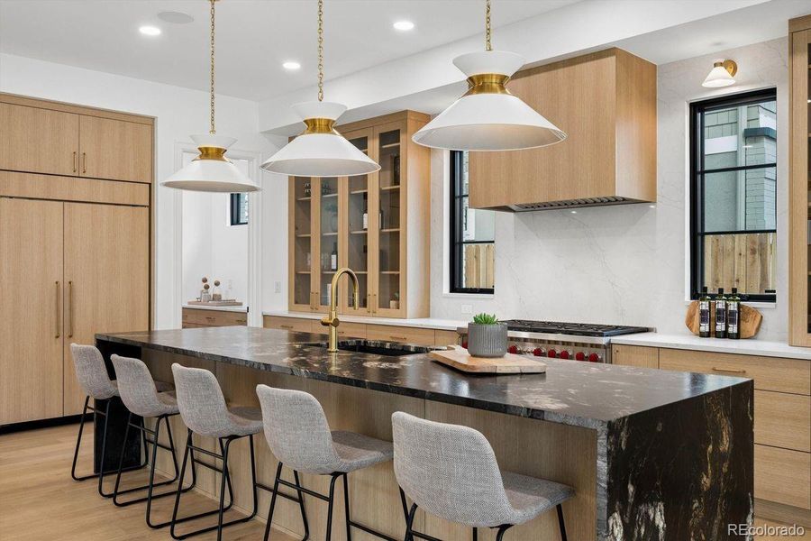 Kitchen boasts top of the line appliances including Wolf & SubZero.