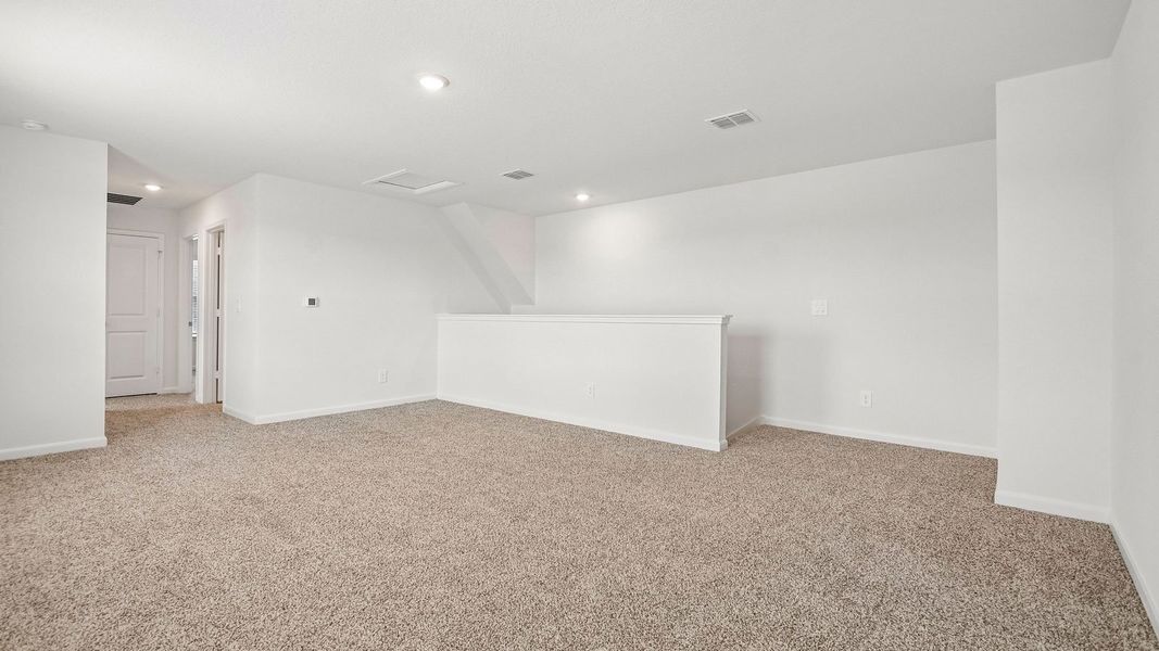 Spacious, unfurnished interior of a new home in Revelry, Del Valle (Image 29).