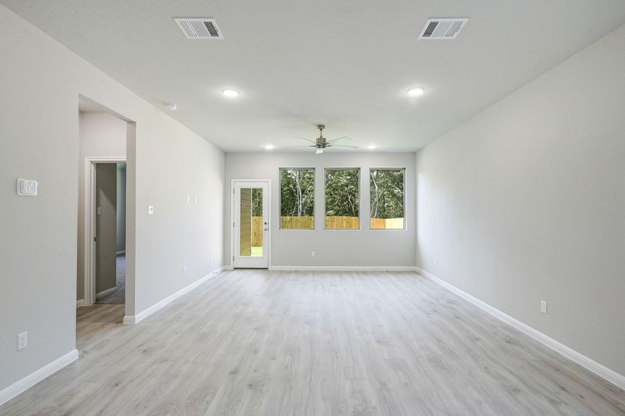 Living Room in the Willow home plan by Trophy Signature Homes – REPRESENTATIVE PHOTO Living Room in the Willow home plan by Trophy Signature Homes – REPRESENTATIVE PHOTO
