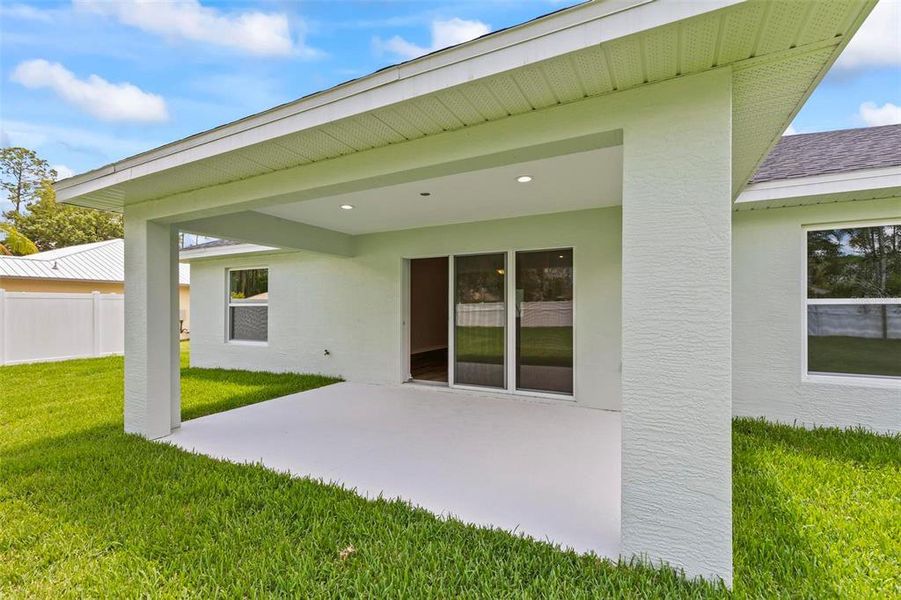 Front exterior of a new home in , Palm Coast, FL, highlighting curb appeal (Image 26).