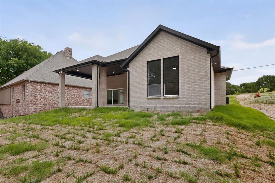 Exterior details and patio area of a home in , Whitney (Image 25). Exterior details and patio area of a home in , Whitney (Image 25).