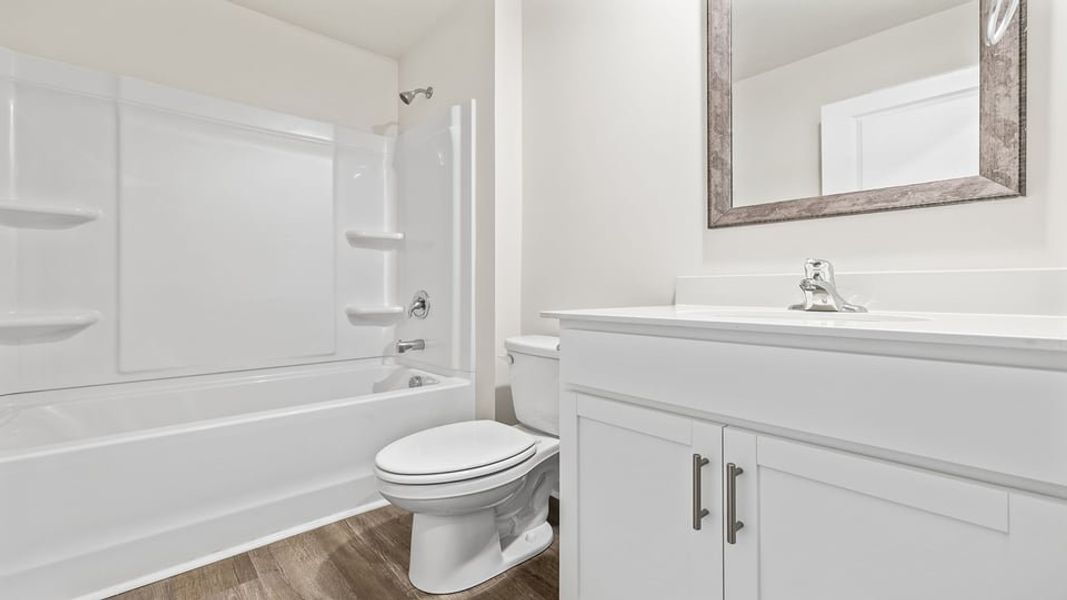 Furnished interior view inside a new home in Lakestone, Woodruff (Image 5).