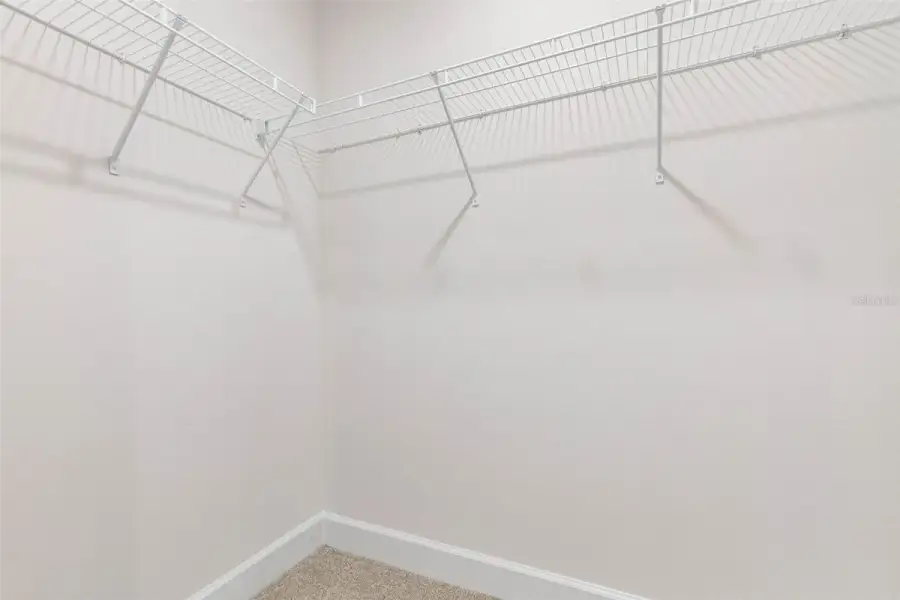 Representative unfurnished interior of a home built from the 2265 by Adams Homes in Flagler Estates, Hastings (Image 54).