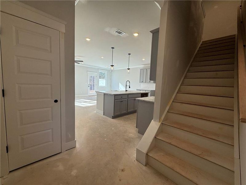 In-progress construction of a new home in The Towns at Auburn Station East, Auburn, GA (Image 10).