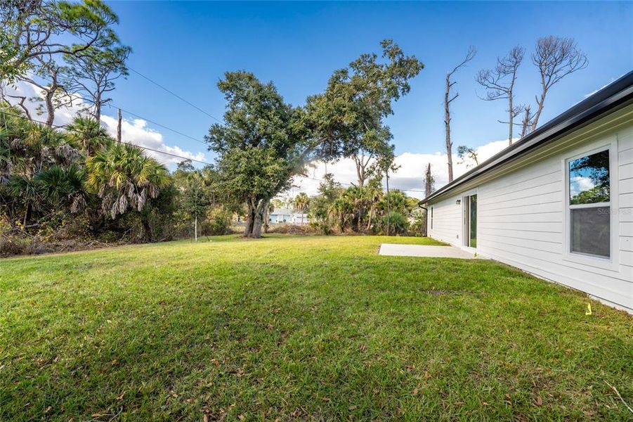 Exterior details and patio area of a home in , North Port (Image 25).