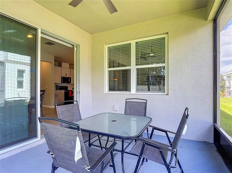 Exterior details and patio area of a home in Seasons at Big Sky, Kissimmee (Image 29).