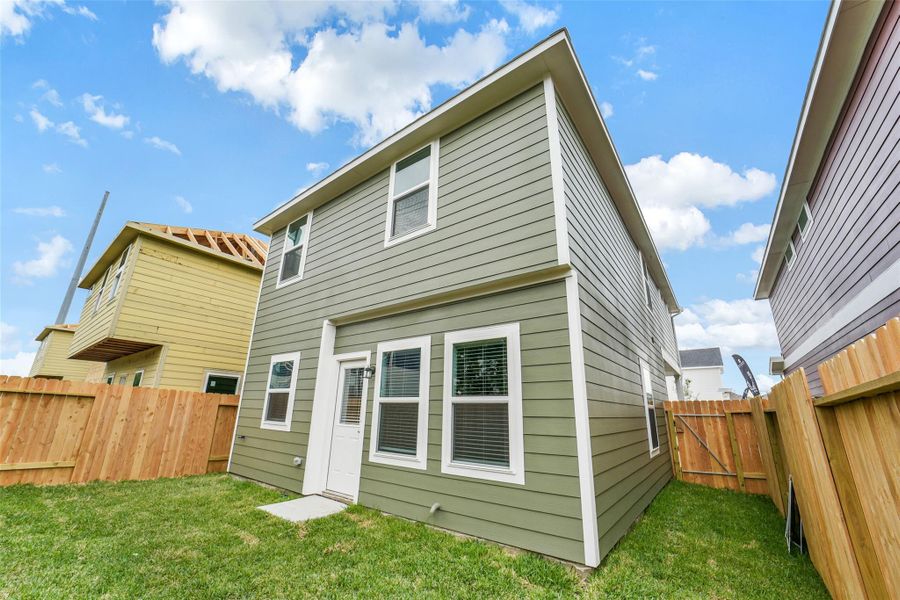 Exterior details and patio area of a home in , Houston (Image 3).