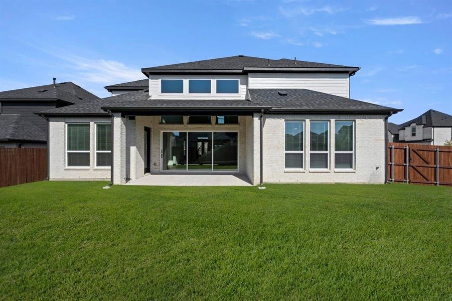 Exterior details and patio area of a home in Birdsong, Mansfield (Image 4).