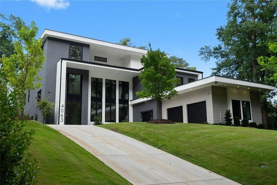 Front exterior of a new home in , Atlanta, GA, highlighting curb appeal (Image 1). Front exterior of a new home in , Atlanta, GA, highlighting curb appeal (Image 1).