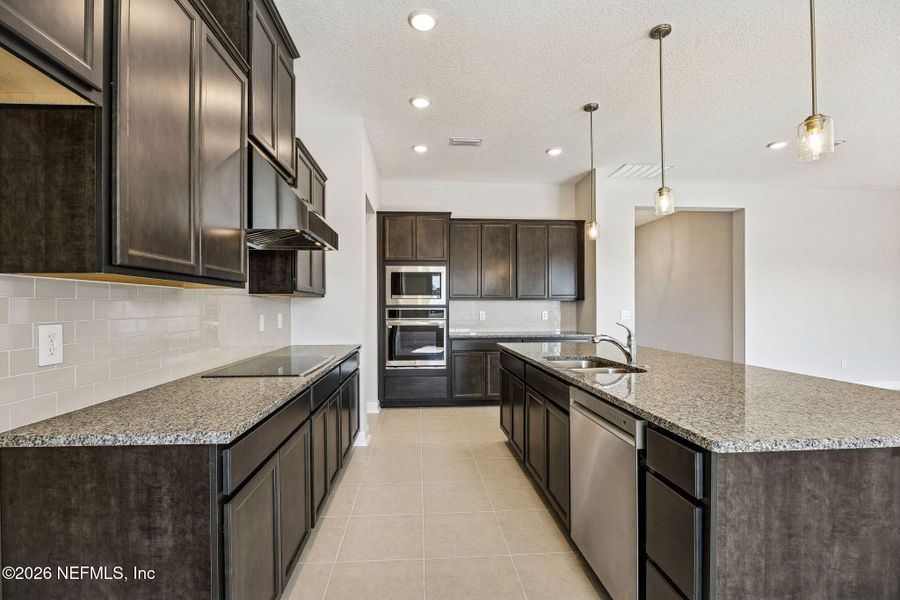 Furnished interior view inside a new home in Sandy Ridge, Yulee (Image 6).