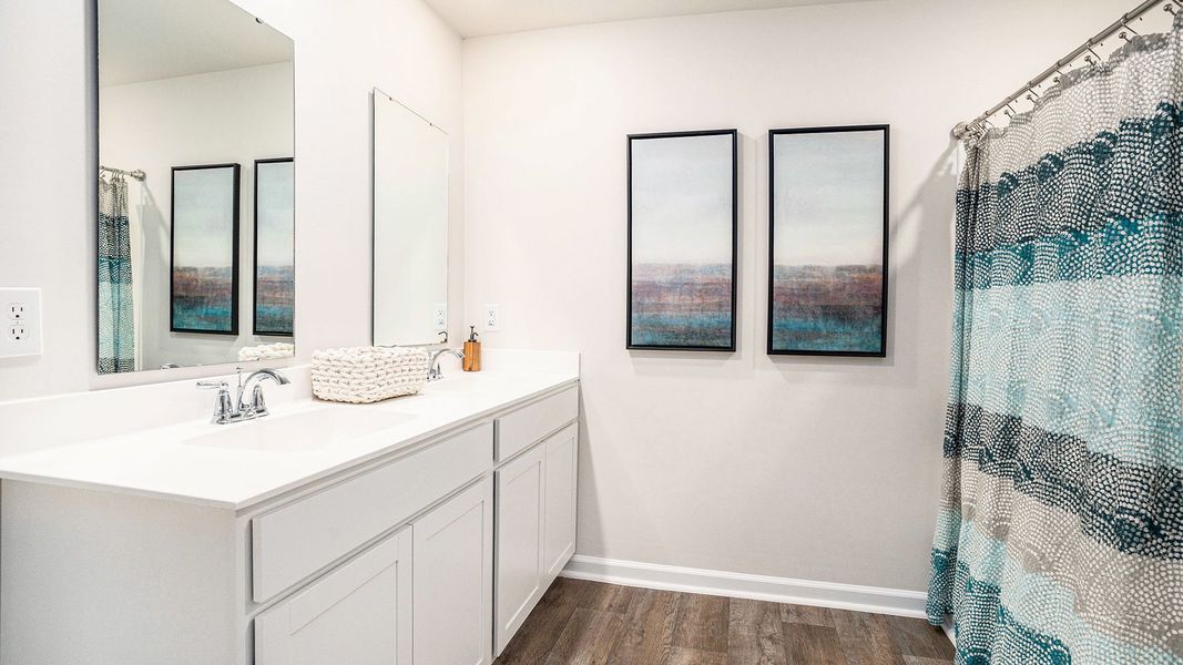Furnished interior view inside a new home in Stanbury Creek, Supply (Image 9).