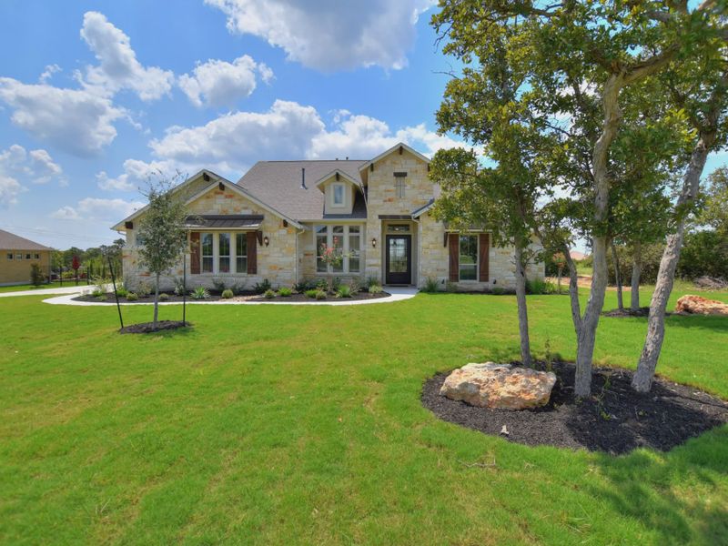 Representative exterior photo of a completed home built from the San Simeon II by Giddens Homes in Leander Estates, Leander, TX (Image 3).