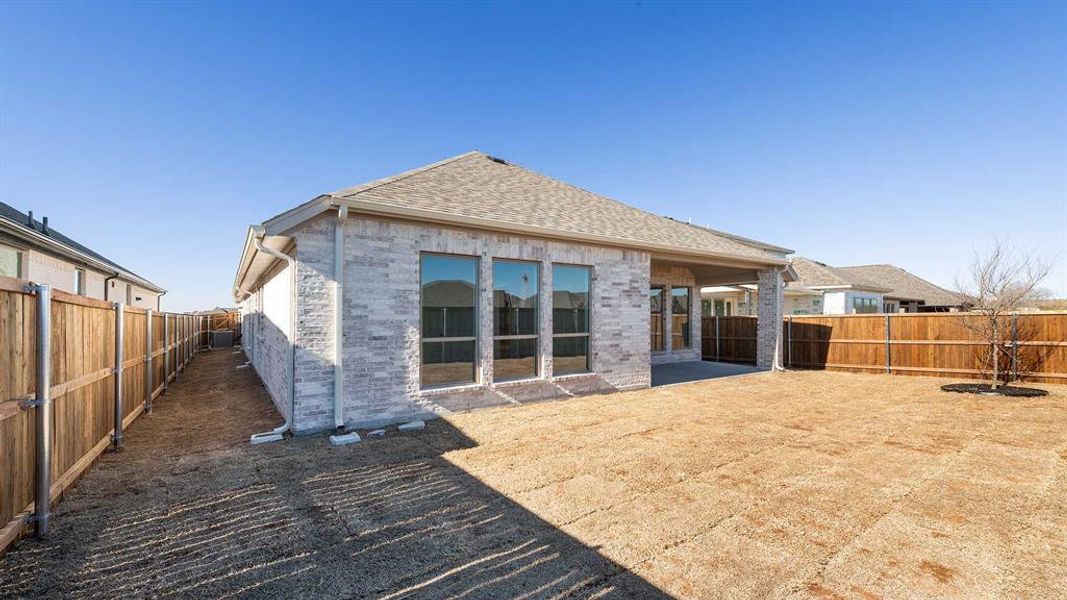 Exterior details and patio area of a home in Devonshire, Forney (Image 3).