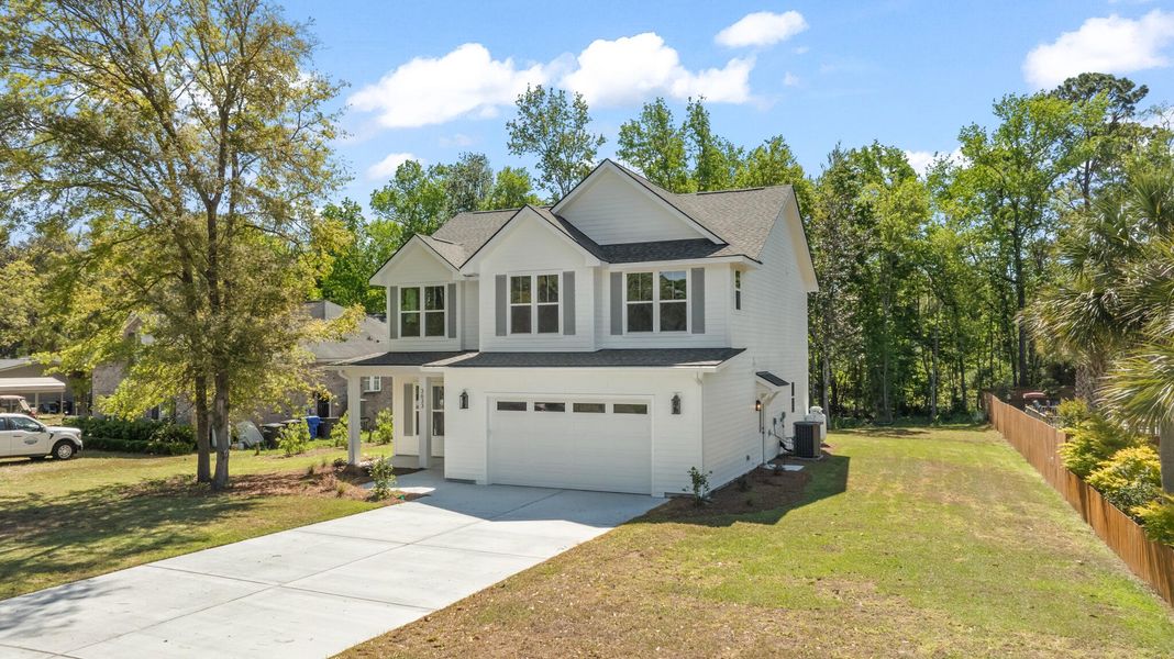 Front exterior of a new home in , Mount Pleasant, SC, highlighting curb appeal (Image 26).