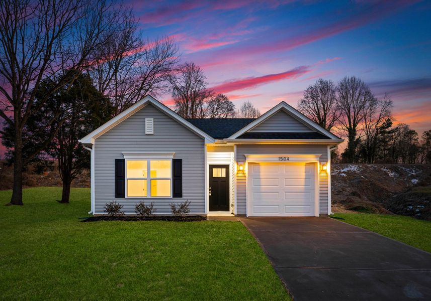 Front exterior of a new home in , Charleston, SC, highlighting curb appeal (Image 1).