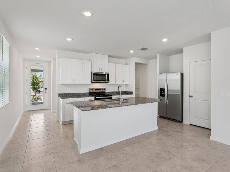Furnished interior view inside a new home in Hamilton Bluff - Classic Series, Haines City (Image 3).
