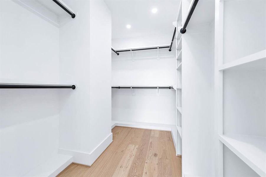 Custom-designed closets equipped with durable, high-quality metal rods.