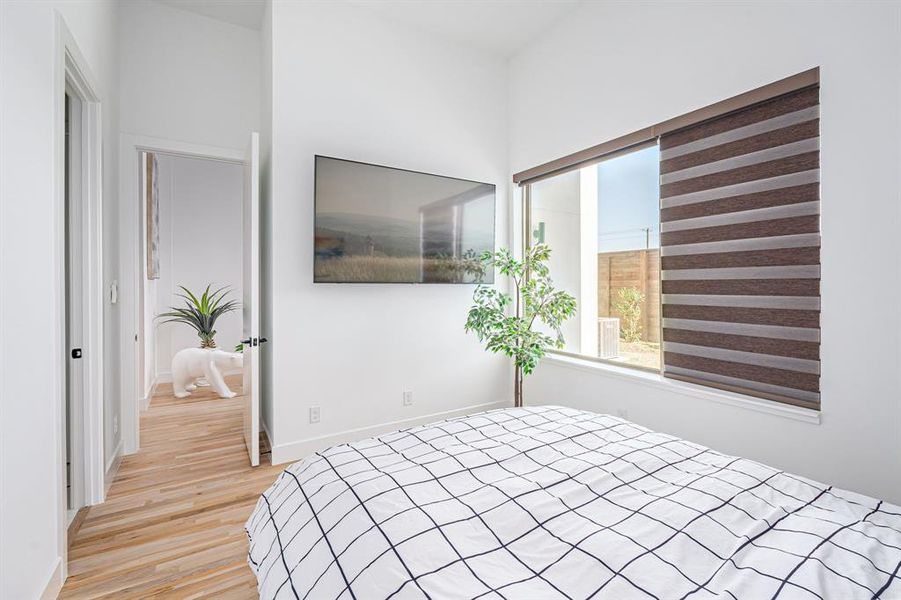 Bedroom featuring light wood-type flooring