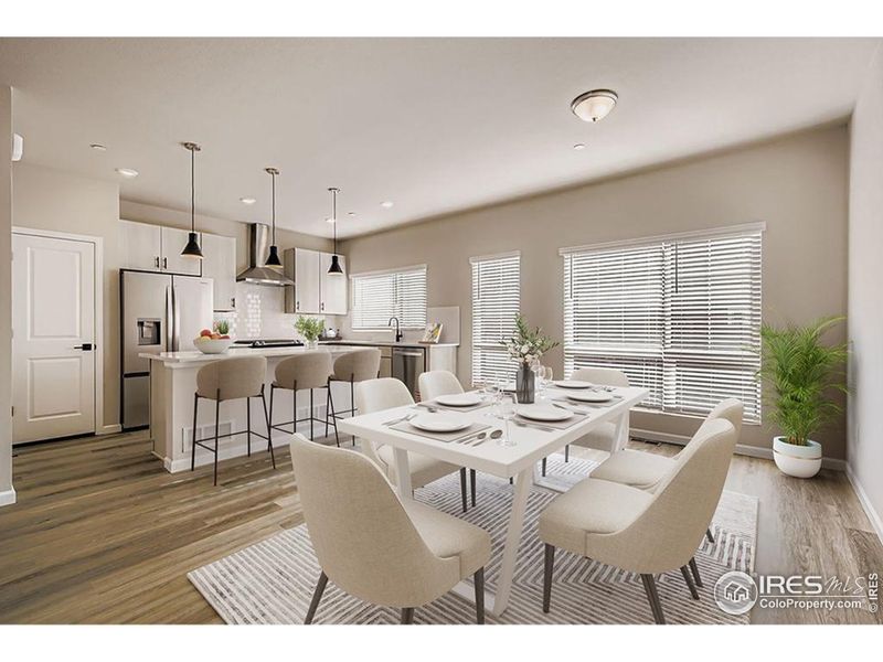 Generous island and tons of natural light flood the kitchen (level 2)