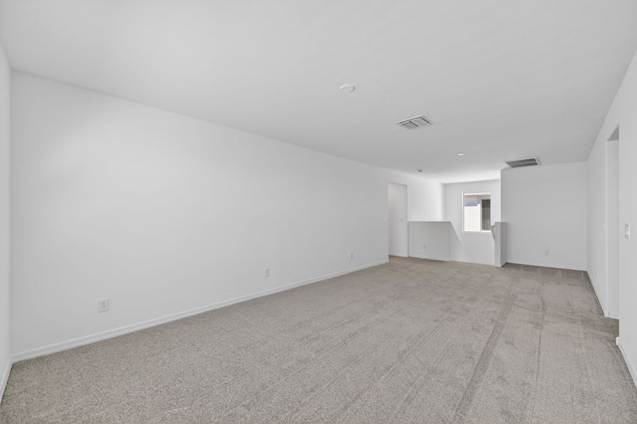 Spacious, unfurnished interior of a new home in Artisan at Asante, Surprise (Image 26).