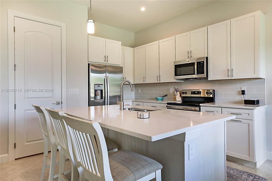 Furnished interior view inside a new home in , Palm City (Image 13).