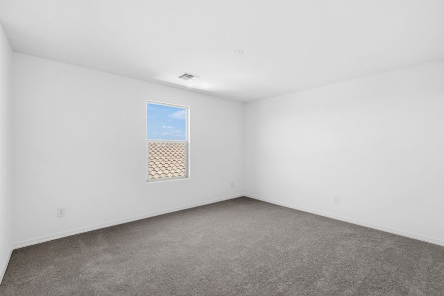 Spacious, unfurnished interior of a new home in Artisan at Asante, Surprise (Image 9).