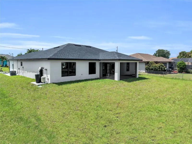 Exterior details and patio area of a home in , Lehigh Acres (Image 29).