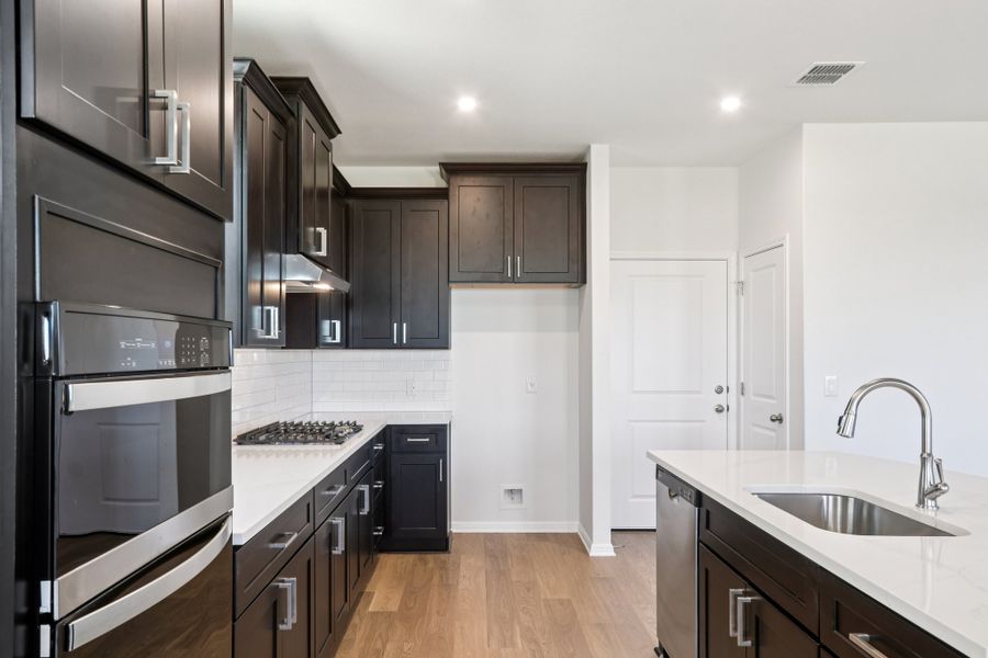 Furnished interior view inside a new home in Porter Country, Buda (Image 9).
