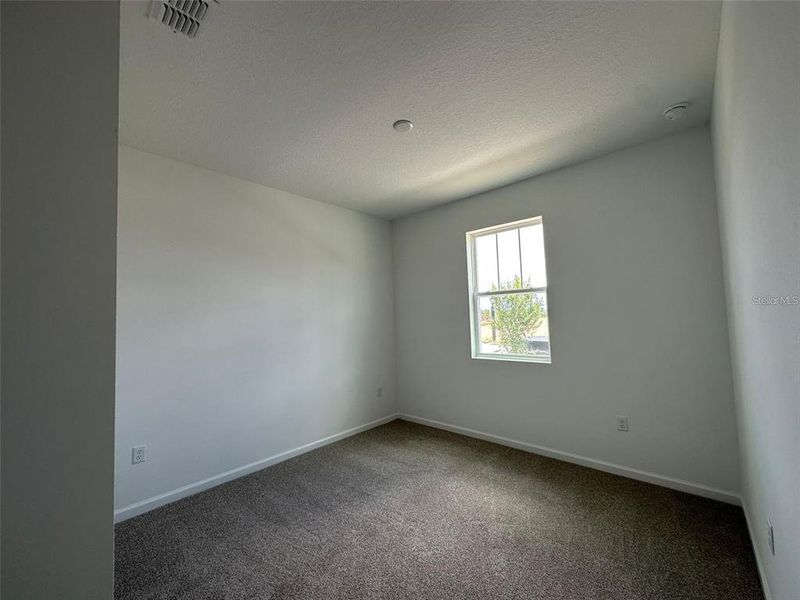 Spacious, unfurnished interior of a new home in Soleil, Kissimmee (Image 20).