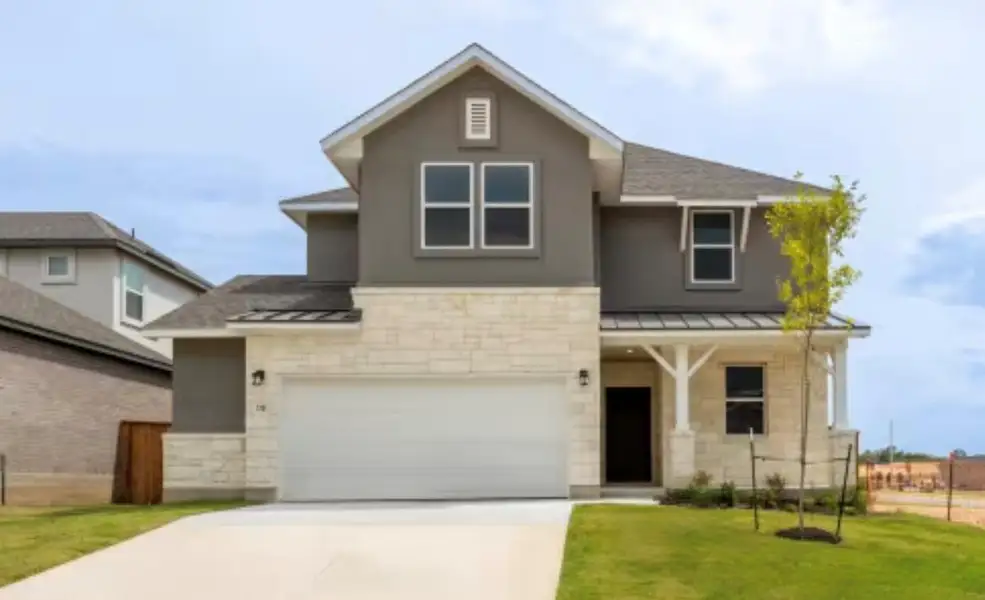 Front exterior of a new home in , Kyle, TX, highlighting curb appeal (Image 2). Front exterior of a new home in , Kyle, TX, highlighting curb appeal (Image 2).