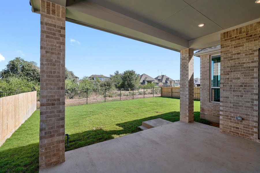 Exterior details and patio area of a home in Santa Rita Ranch, Liberty Hill (Image 3).