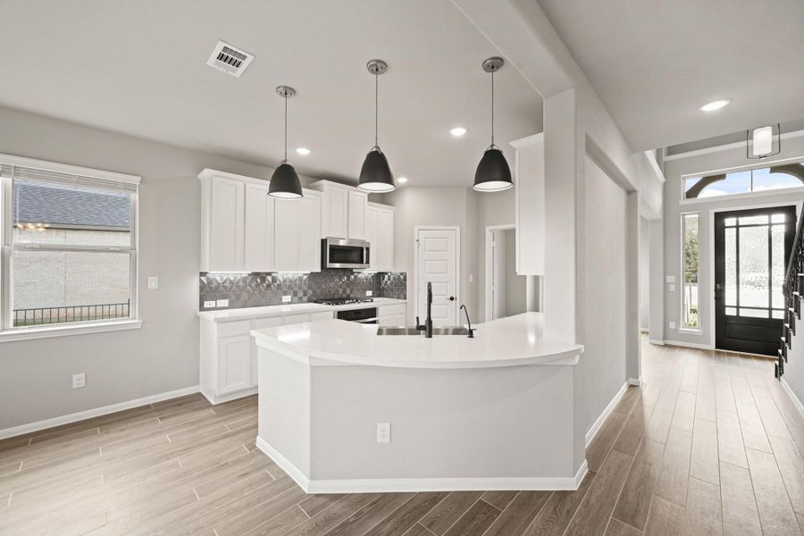 Furnished interior view inside a new home in Waterstone on Lake Conroe, Montgomery (Image 7). Furnished interior view inside a new home in Waterstone on Lake Conroe, Montgomery (Image 7).