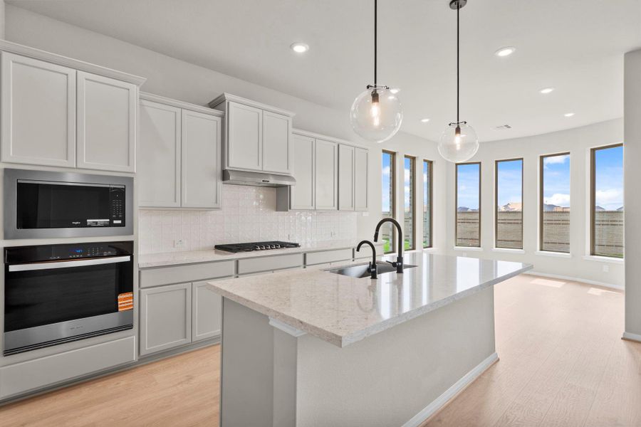 Furnished interior view inside a new home in Bridgeland, Cypress (Image 14).