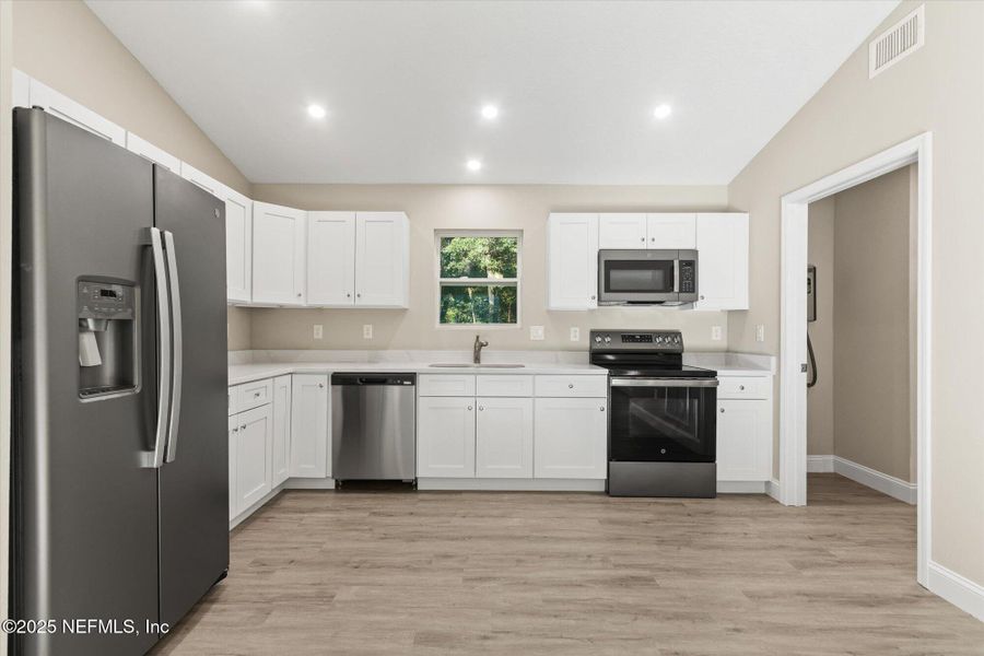 Furnished interior view inside a new home in , Interlachen (Image 3).