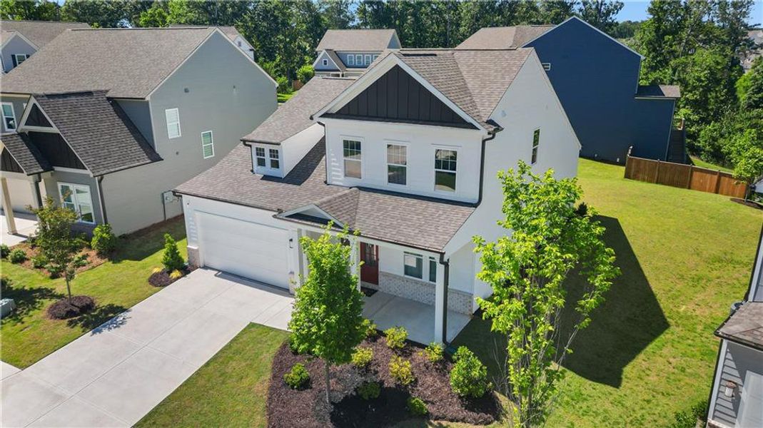 Front exterior of a new home in Edgewater, Canton, GA, highlighting curb appeal (Image 14).