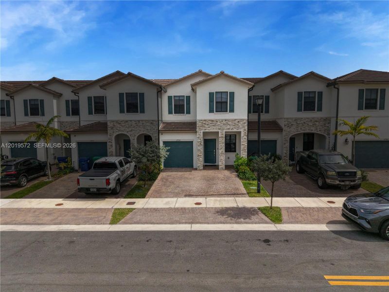 Front exterior of a new home in , Miami, FL, highlighting curb appeal (Image 24). Front exterior of a new home in , Miami, FL, highlighting curb appeal (Image 24).
