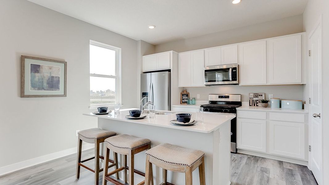 Representative furnished interior of a home built from the The Sienna by D.R. Horton in Thornton Townes, Raleigh (Image 8).